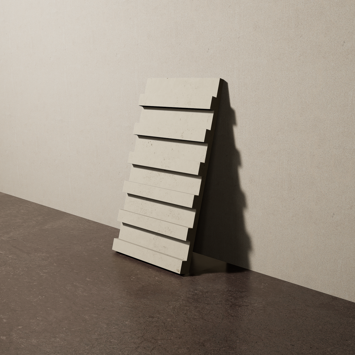 a 15"x8" bespoke dimensional concrete tile with six evenly spaced tiers leans against a textured, plaster wall on an unfinished concrete floor