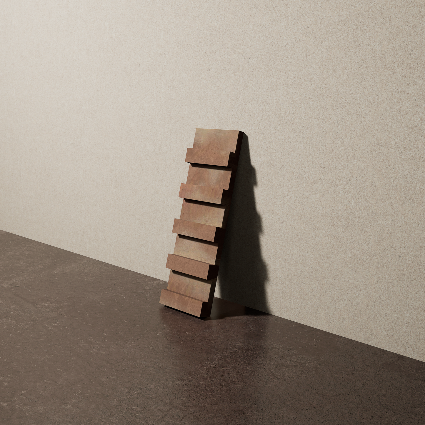 a 4"x12.5" bespoke dimensional concrete tile with five evenly spaced tiers leans against a textured, plaster wall on an unfinished concrete floor