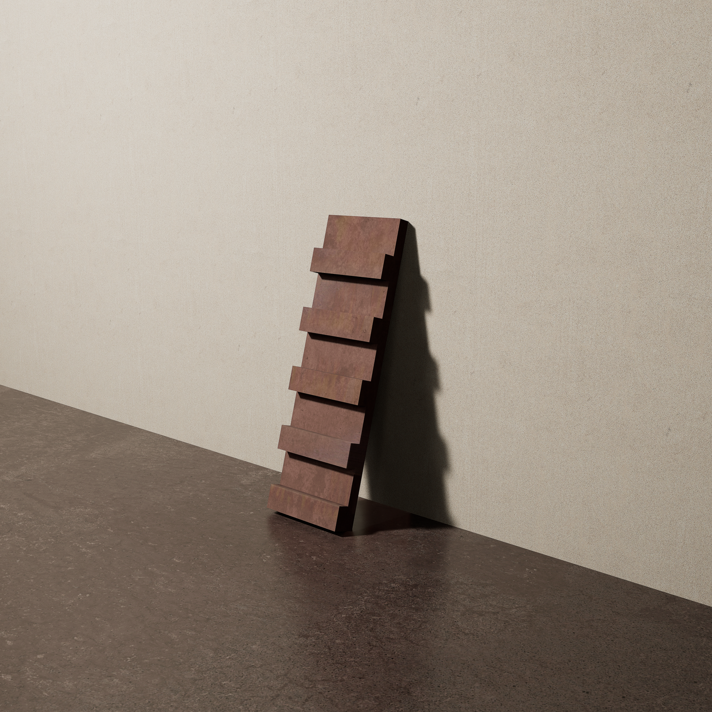 a 4"x12.5" bespoke dimensional concrete tile with five evenly spaced tiers leans against a textured, plaster wall on an unfinished concrete floor