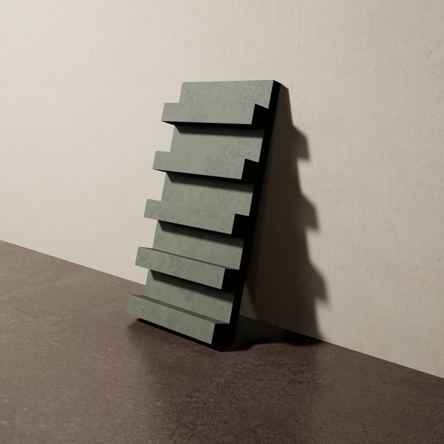 a 16"x8" bespoke heavy concrete tile with five evenly spaced ribs leans against a textured, plaster wall on an unfinished concrete floor