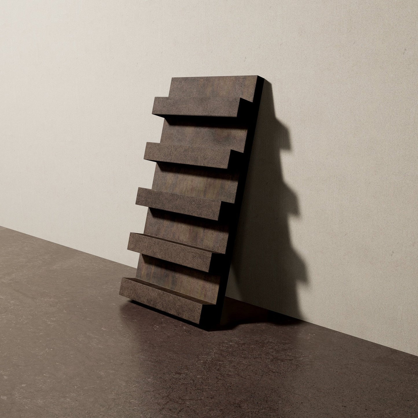 a 16"x8" bespoke heavy concrete tile with five evenly spaced ribs leans against a textured, plaster wall on an unfinished concrete floor