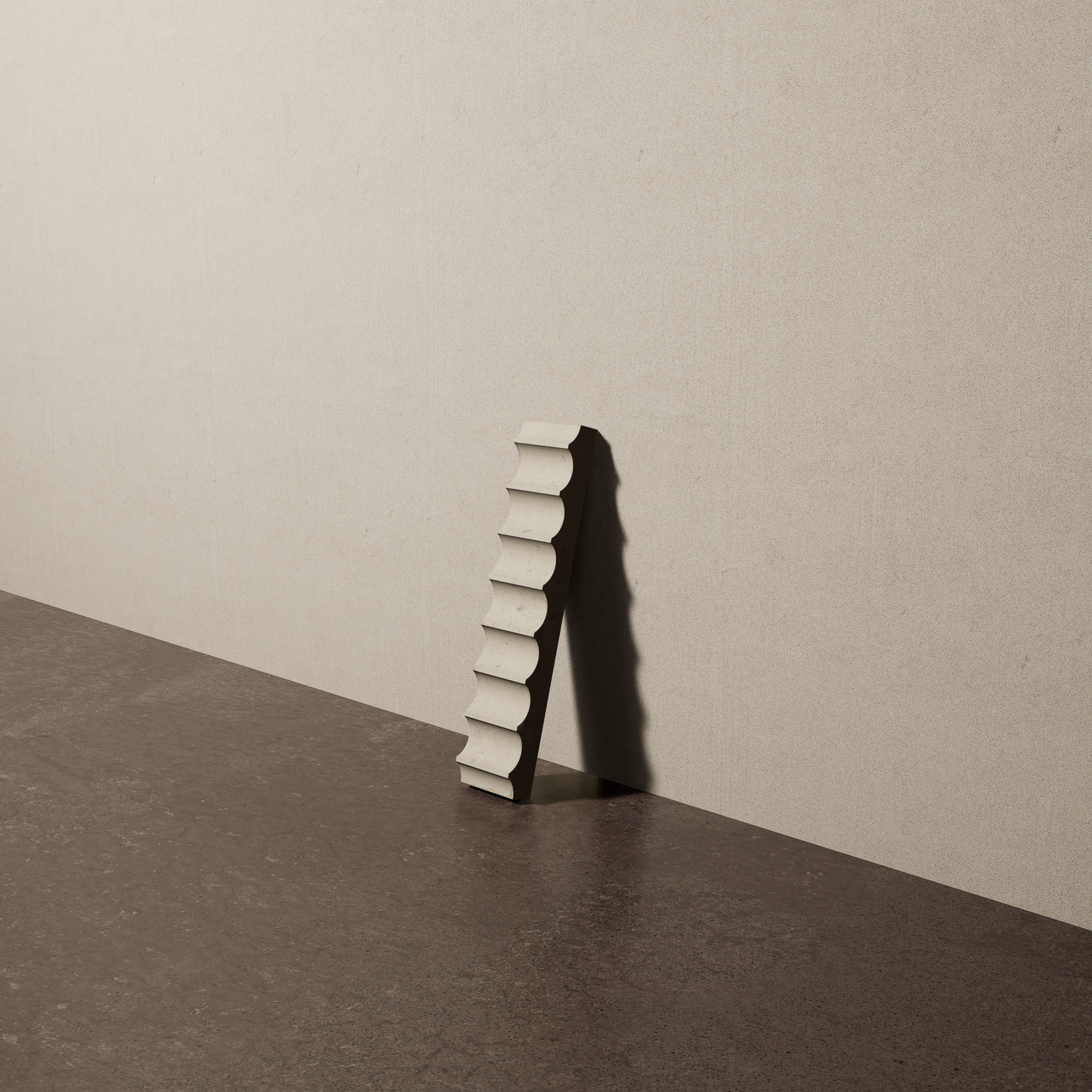 a 2"x10" bespoke fluted concrete tile with eight peaks leans against a textured, plaster wall on an unfinished concrete floor