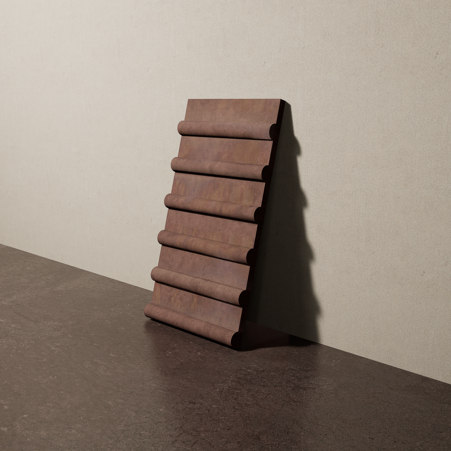 a 8"x15" bespoke concrete tile with six rounded ribs leans against a textured, plaster wall on an unfinished concrete floor