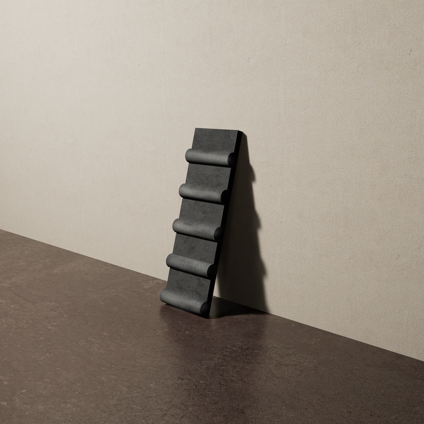 a 4"x12.5" bespoke concrete tile with five rounded ribs leans against a textured, plaster wall on an unfinished concrete floor