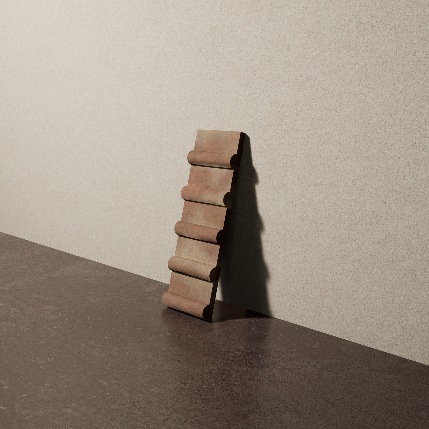 a 4"x12.5" bespoke concrete tile with five rounded ribs leans against a textured, plaster wall on an unfinished concrete floor