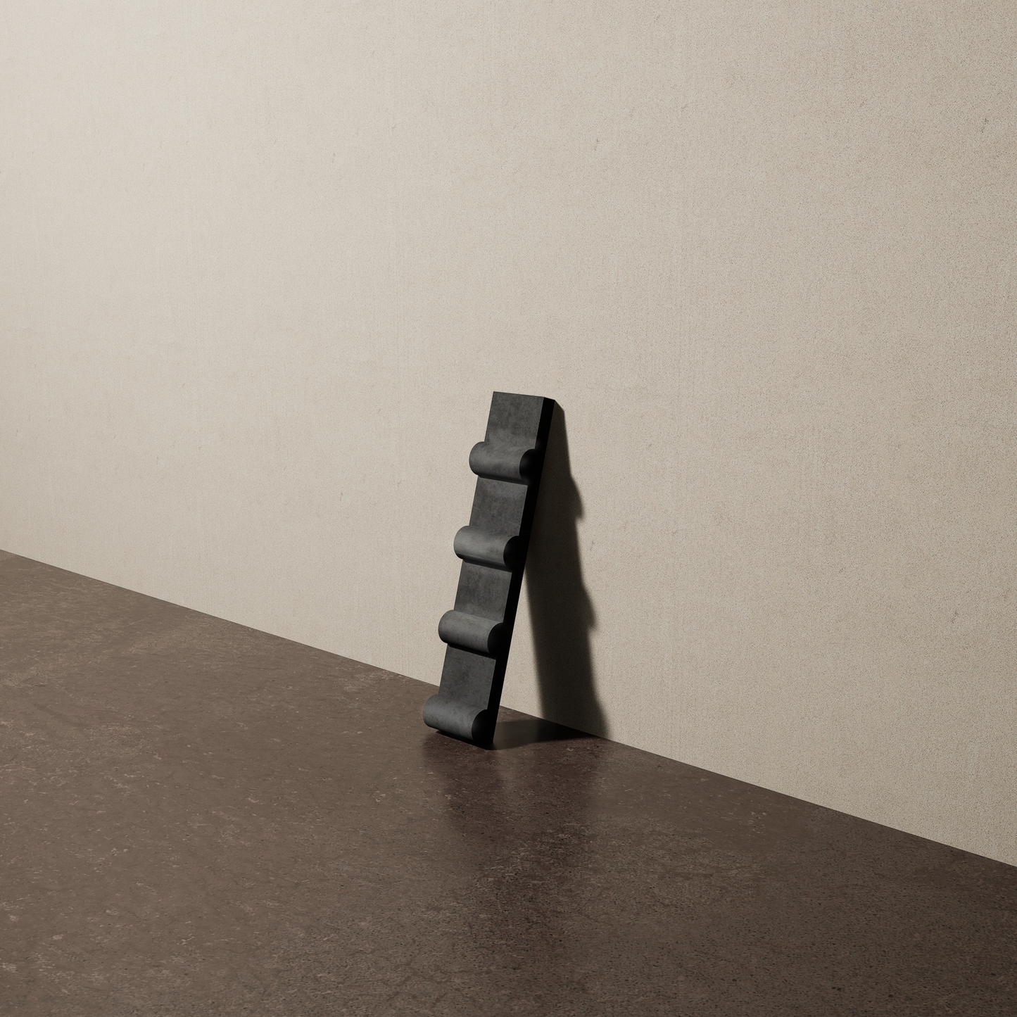 a 2"x10" bespoke concrete tile with four rounded ribs leans against a textured, plaster wall on an unfinished concrete floor